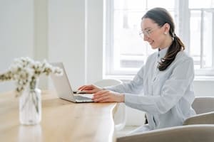 female-programmer-student-in-a-blue-shirt