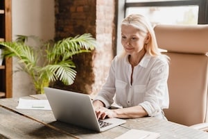 tutor-teacher-working-typing-on-laptop-searching