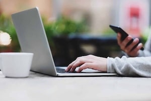 businessman-checking-emails-web-content-on-mobile