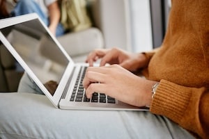 Education, mockup and laptop with hands of student typing for knowledge, internet and research. Uni