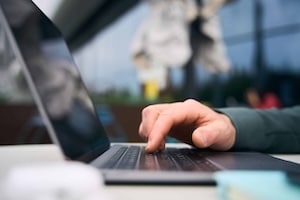 man-hand-using-laptop-shopping-online-ordering