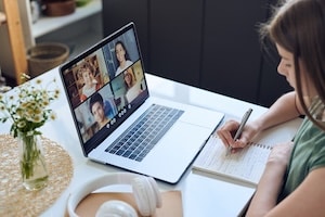 Coach hosting live webinar to connect with prospects and add value