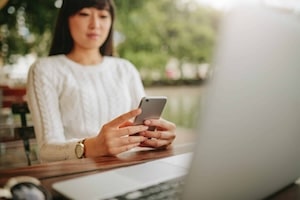 Asian woman using mobile phone