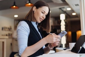 Small business marketer working on social content plan for brand visibility