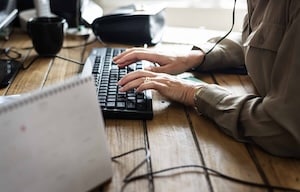 Caucasian woman using computer