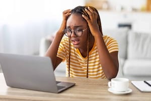 Stressful black woman freelancer