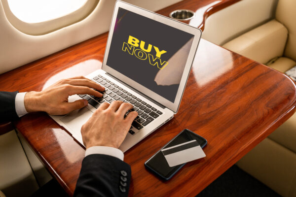 Laptop screen with bright yellow buy now call-to-action and countdown