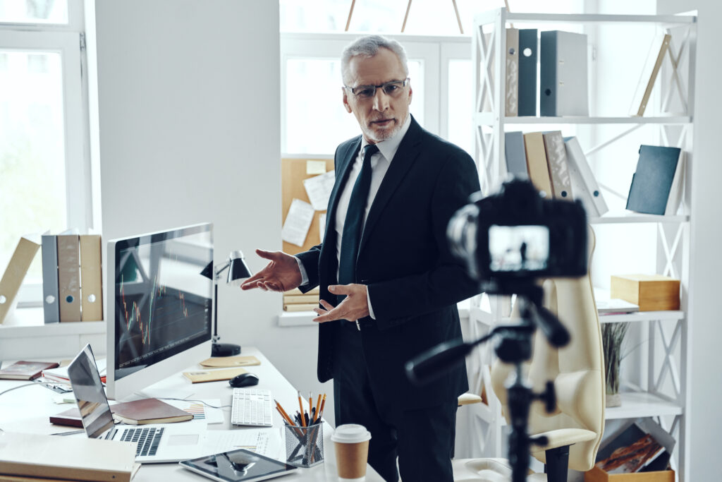 Businessman creating professional marketing content in a modern office