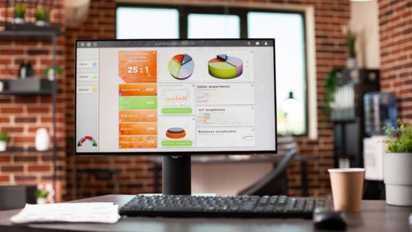 Computer screen showing website analytics dashboard with charts and performance metrics to highlight monthly update needs for businesses