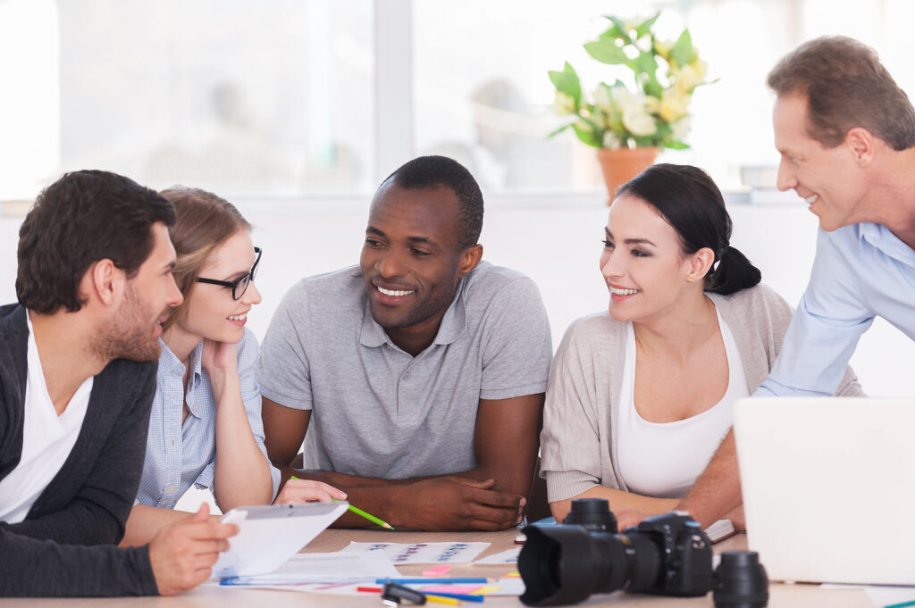 Marketing team discussing content strategy and brand tone