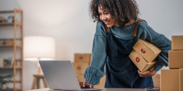 Small business owner verifying website trust and user journey