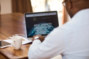 Small business owner reviewing his company’s homepage layout to improve website performance and conversions.