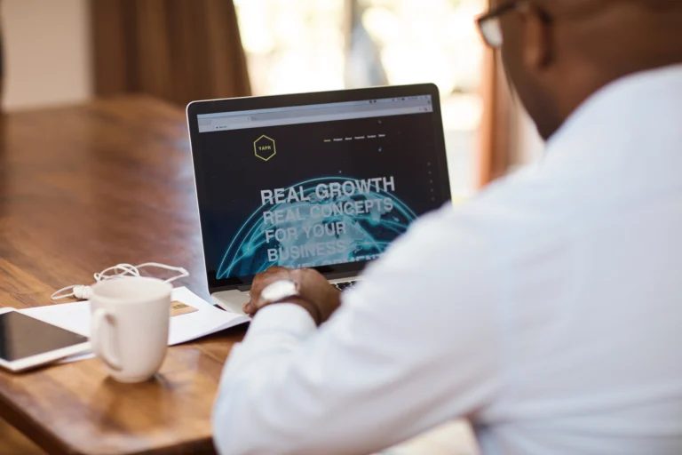 Small business owner reviewing his company’s homepage layout to improve website performance and conversions.