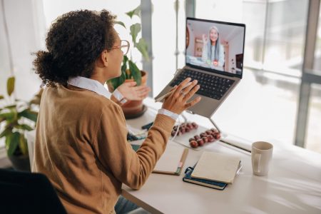 smiling-business-woman-have-video-conference