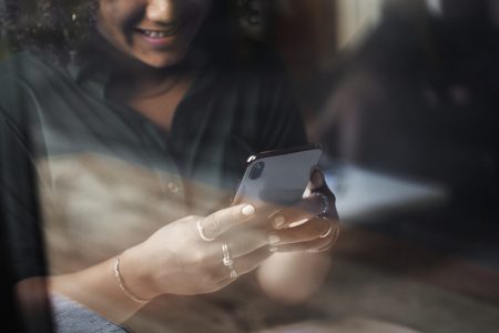 Woman texting on a phone